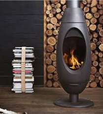 Печь-камин Invicta OVE стальная в интерьере Амазонка бай фото в Могилеве