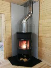 Недорогой камин с отделкой шамотом Сибирь 12 фото в интерьере в Могилеве