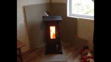 Отопительная печь Термофор Статика Тетра, чёрная бронза фото в интерьере в Могилеве