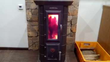 Стальная печь Термофор Статика Тетра, чёрная бронза фото в интерьере в Могилеве