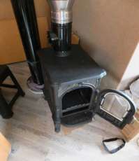 Недорогой печь-камин со стеклом Сибирь 6 фото в интерьере в Могилеве