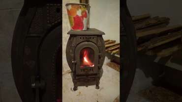 Печь отопительно-варочная чугунная "Сибирь" фото в интерьере в Могилеве