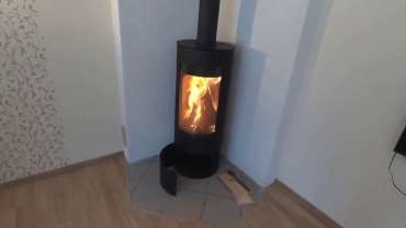 Стильная печь-камин с шамотом Мета-Бел Селигер в Могилеве фото в интерьере в Могилеве