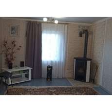 Стальной камин с шамотом Мета-Бел Ритм L фото в интерьере в Могилеве