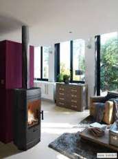 Печь-камин чугунный Invicta Gomont в интерьере Амазонка бай фото в Могилеве