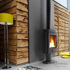 Печь-камин чугунный Invicta Mesnil в интерьере Амазонка бай фото в Могилеве