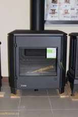 Печь-камин чугунный Invicta Carolo в интерьере Амазонка бай фото  в Могилеве