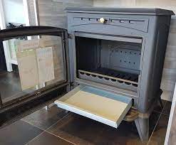 Печь-камин чугунный Invicta Altea в интерьере Амазонка бай фото в Могилеве