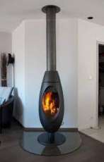 Печь-камин чугунный Invicta Ove в интерьере Амазонка бай фото в Могилеве