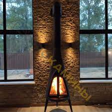 Печь-камин чугунный Invicta Pow-Wow в интерьере Амазонка бай фото в Могилеве