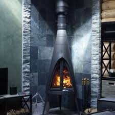 Печь-камин чугунный Invicta Pow-Wow в интерьере Амазонка бай фото в Могилеве